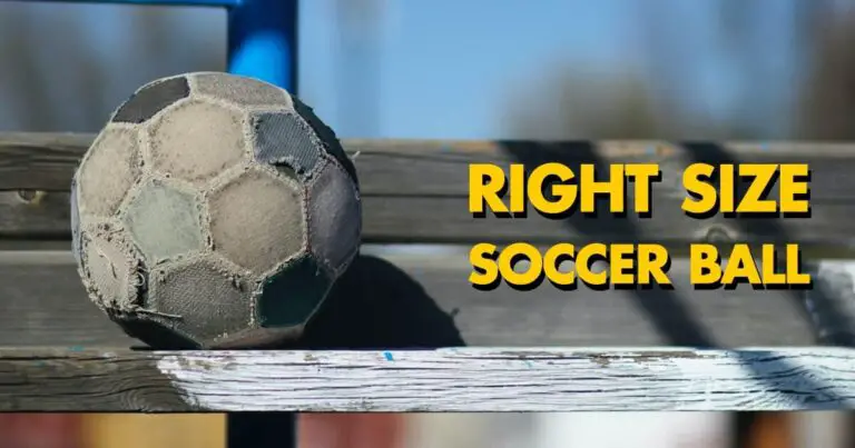 Old soccer ball sitting on a wooden bench